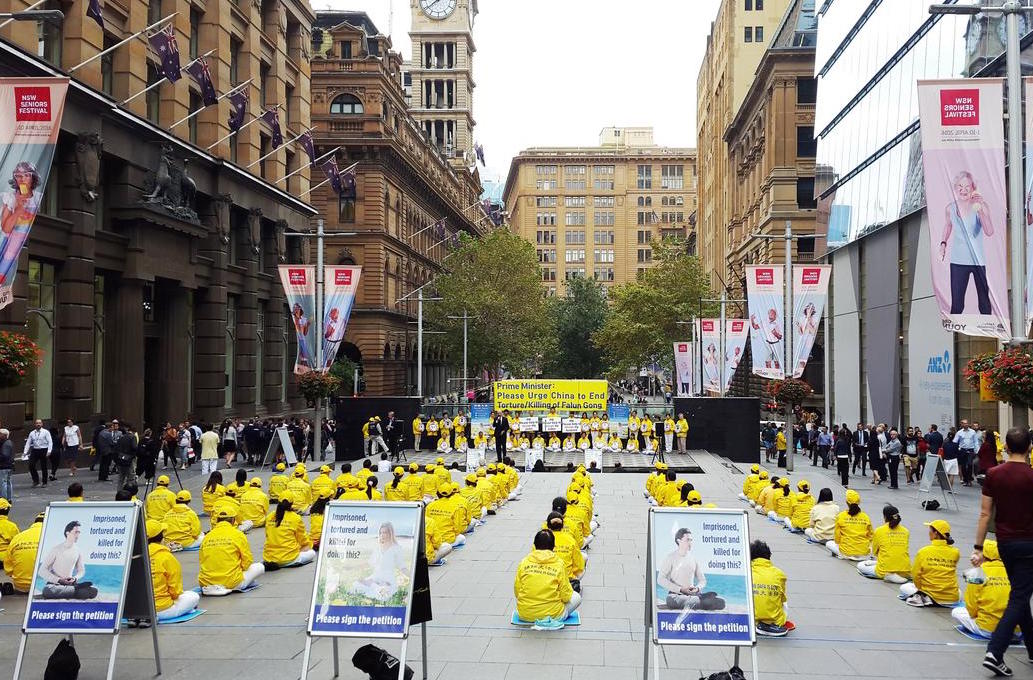 Image for article Praticantes apelam ao primeiro-ministro australiano para parar com a perseguição ao Falun Gong