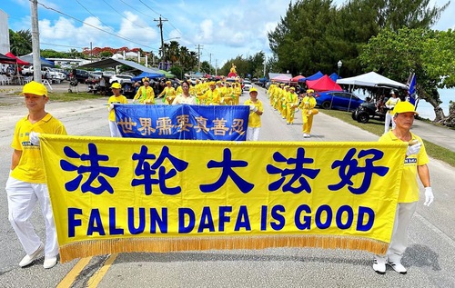 Image for article Saipan, EUA: Grupo do Falun Dafa é convidado para se apresentar no desfile do Dia da Independência