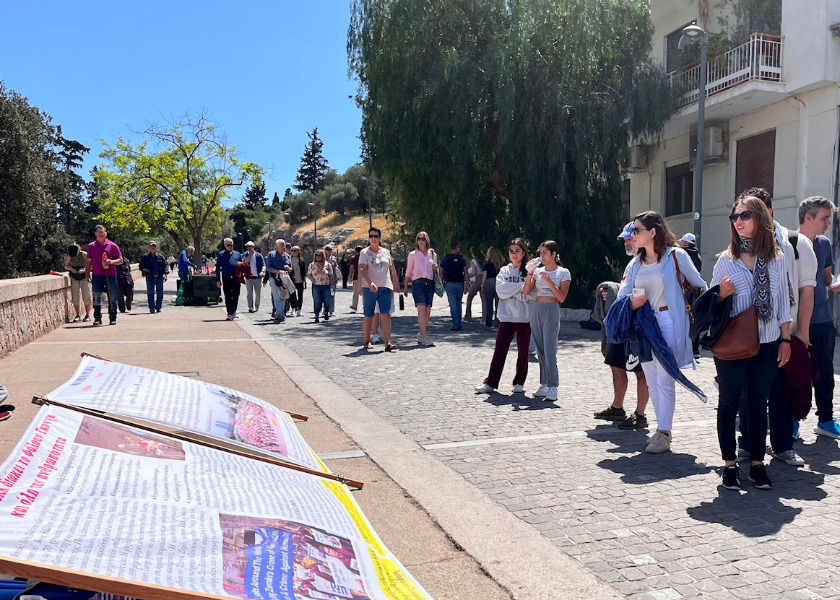 Image for article ​Grécia: Cidadãos condenam a perseguição contínua ao Falun Dafa durante eventos em Atenas