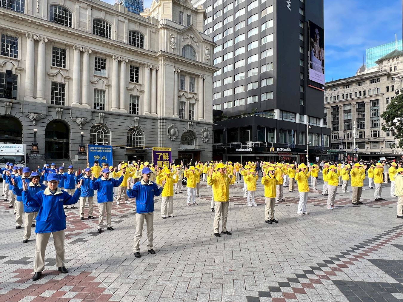 Image for article Nova Zelândia: Manifestação e desfile realizados para aumentar a conscientização sobre a perseguição em curso durante o Dia da ONU em Apoio às Vítimas de Tortura