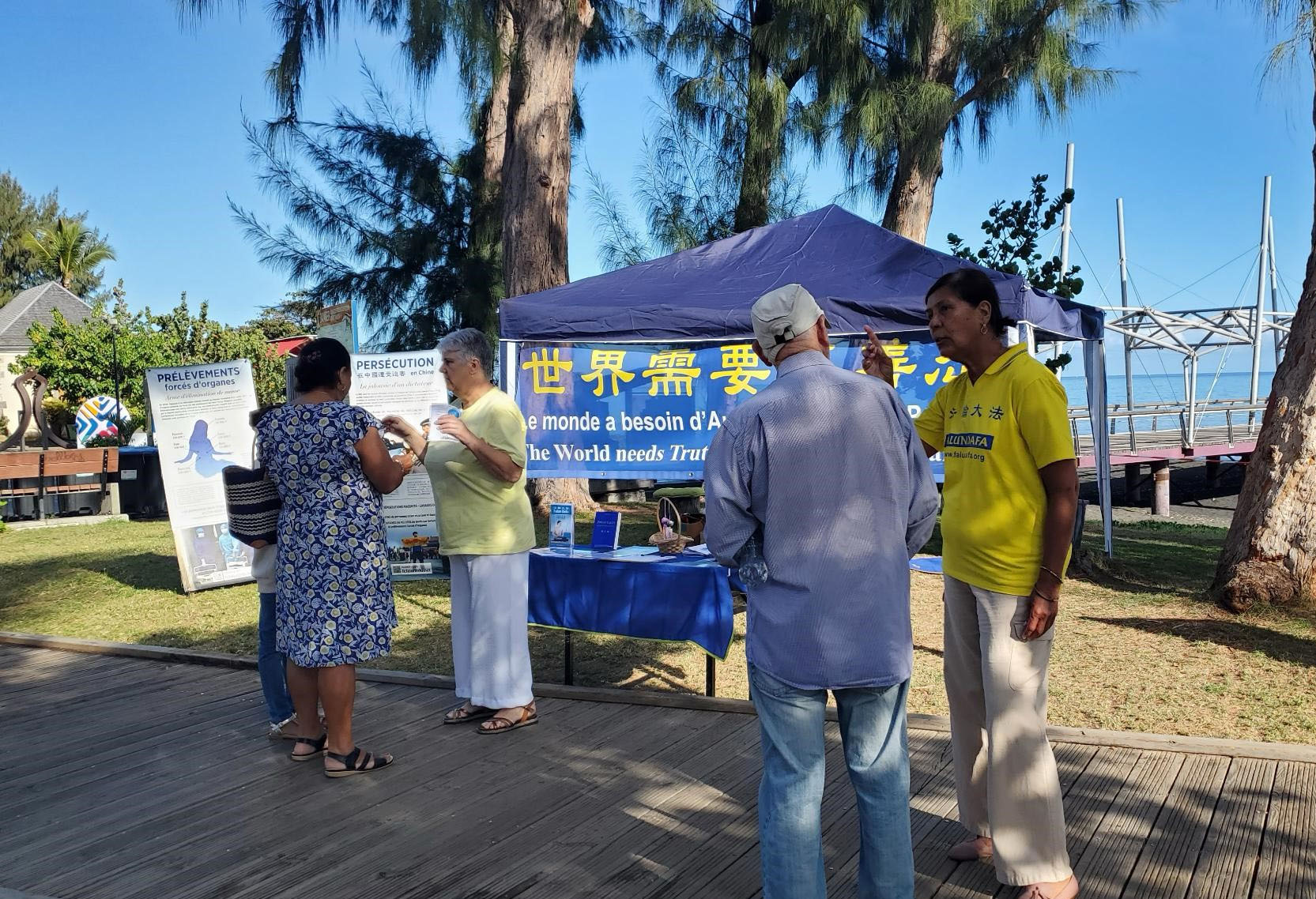 Image for article Saint-Paul, Ilha da Reunião: Atividades para aumentar a conscientização sobre a perseguição contínua ao Falun Gong