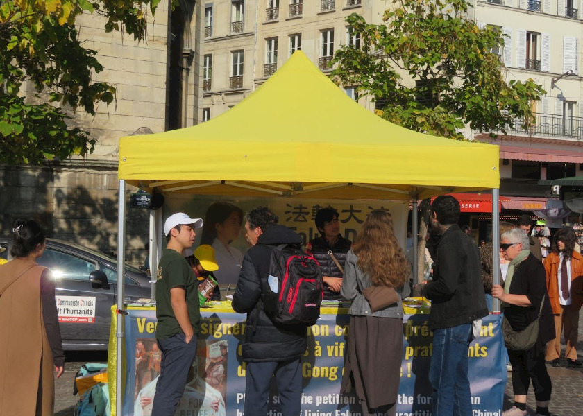 Image for article ​Paris, França: Público condena a perseguição do PCC ao Falun Dafa